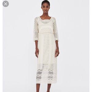 Embroidered dress with square cut neckline